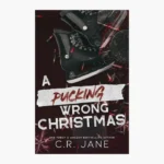 A Pucking Wrong Christmas: A Hockey Romance Book by C R Jane
